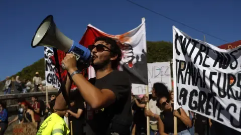 France-Wide Strikes Erupt Opposing Budget Slashing